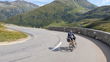 Connecting rivers, land and ocean on a bike_Day 1 Alps Rhine trickle in background_NL.jpg